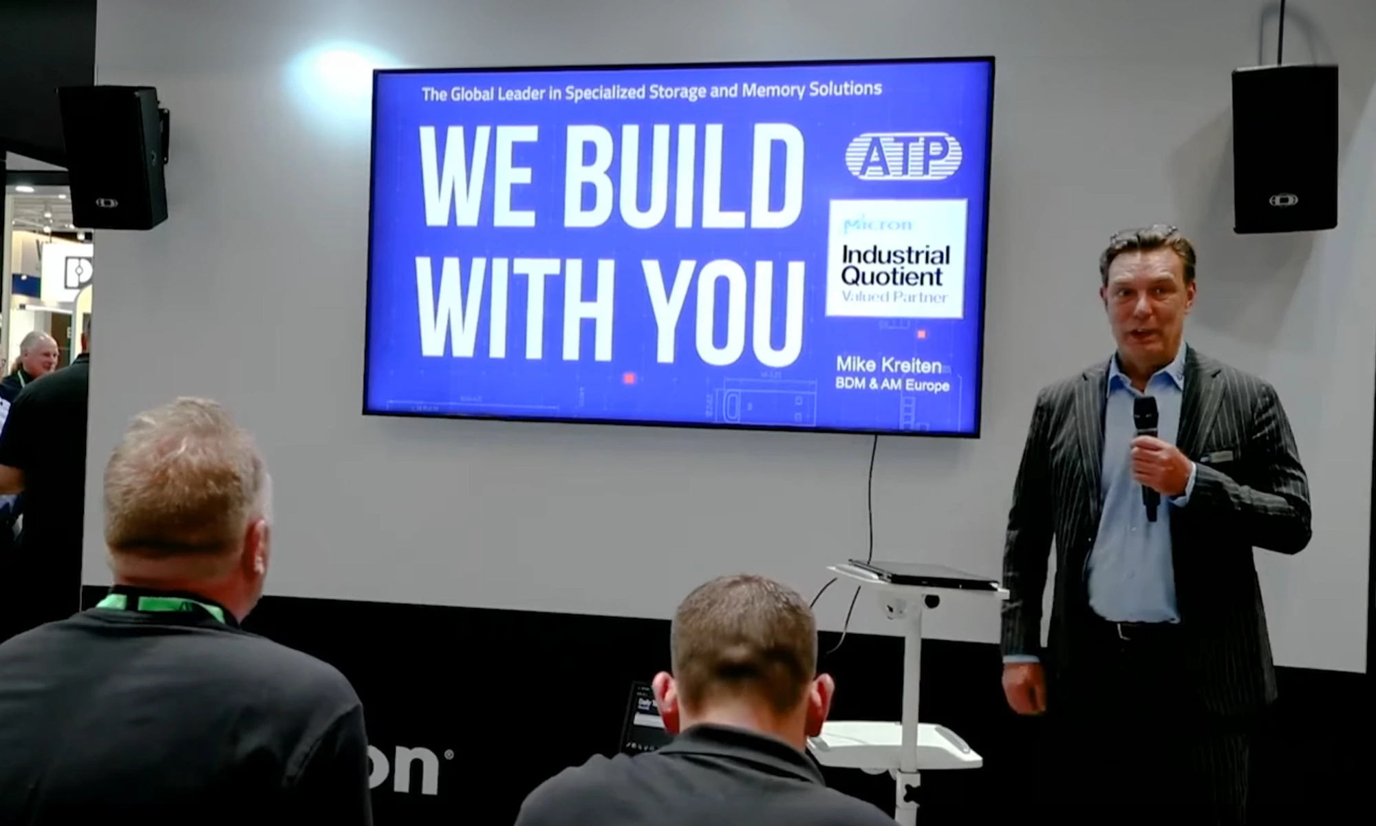 Man presenting in a conference room
